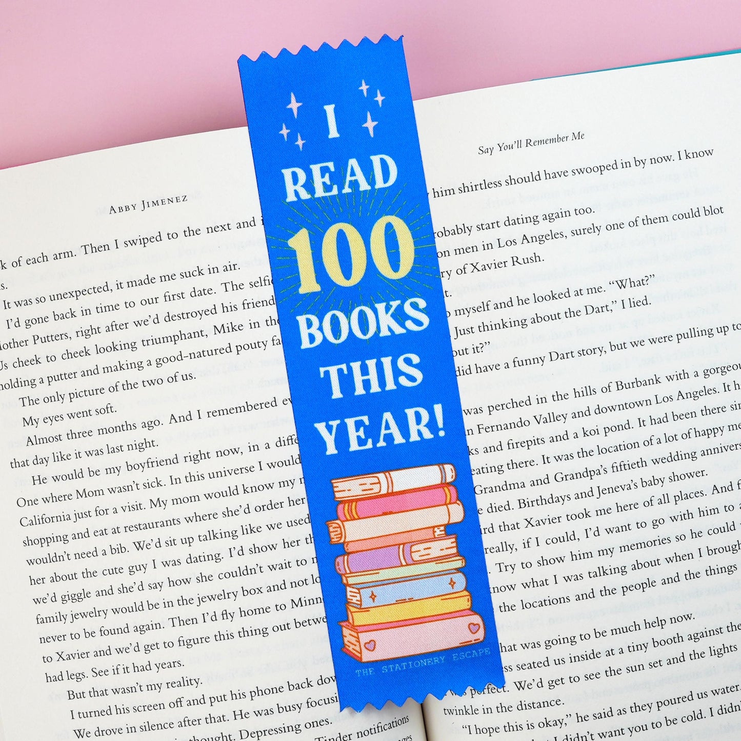 Blue bookmark with 'I Read 100 Books This Year!' text on a book