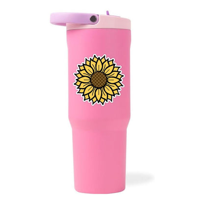 Pink tumbler with a sunflower design on a white background