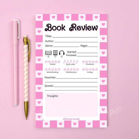 Book review notepad with pink checkered border and heart patterns on a pink background