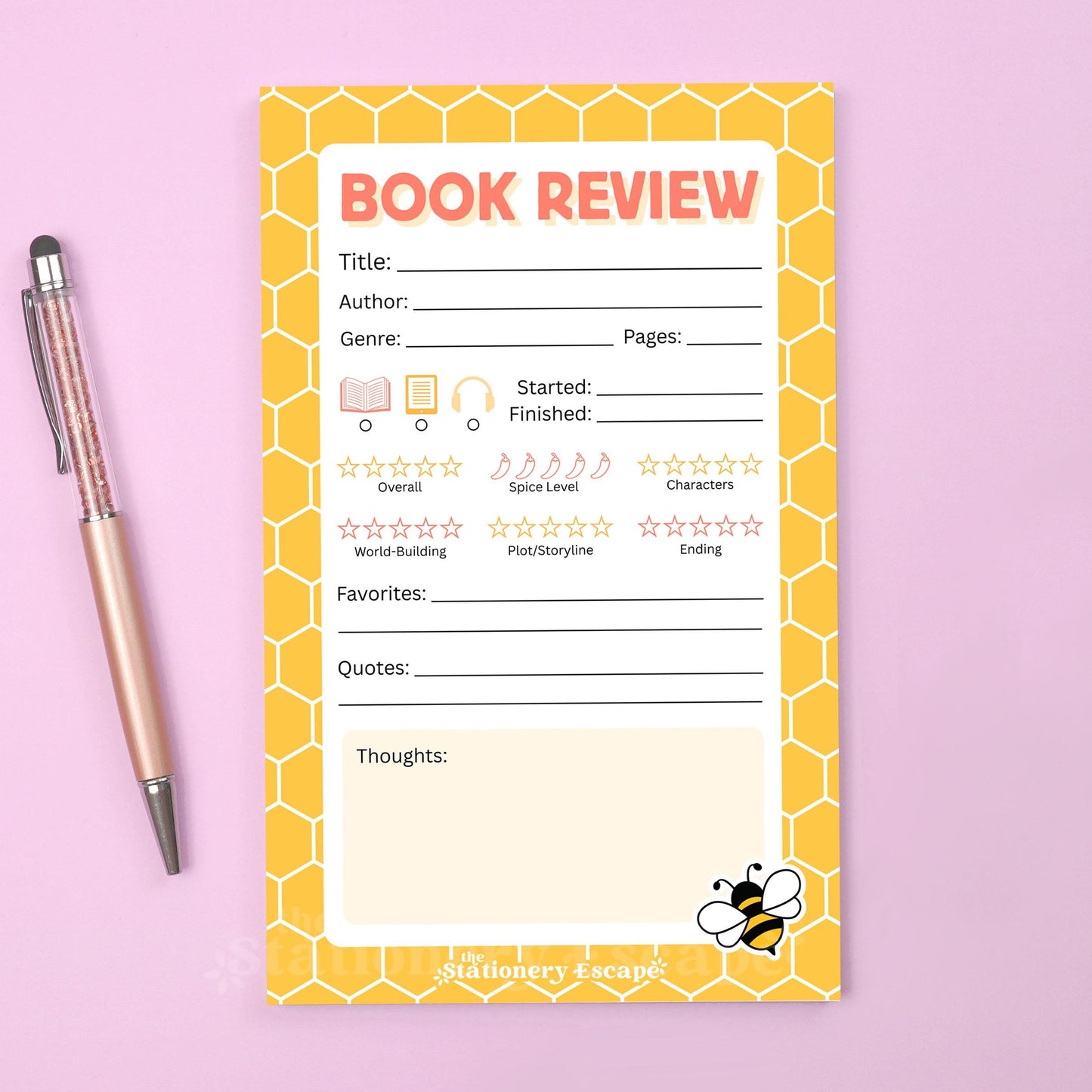 Book review notepad with honeycomb design and bee illustration on a pink background