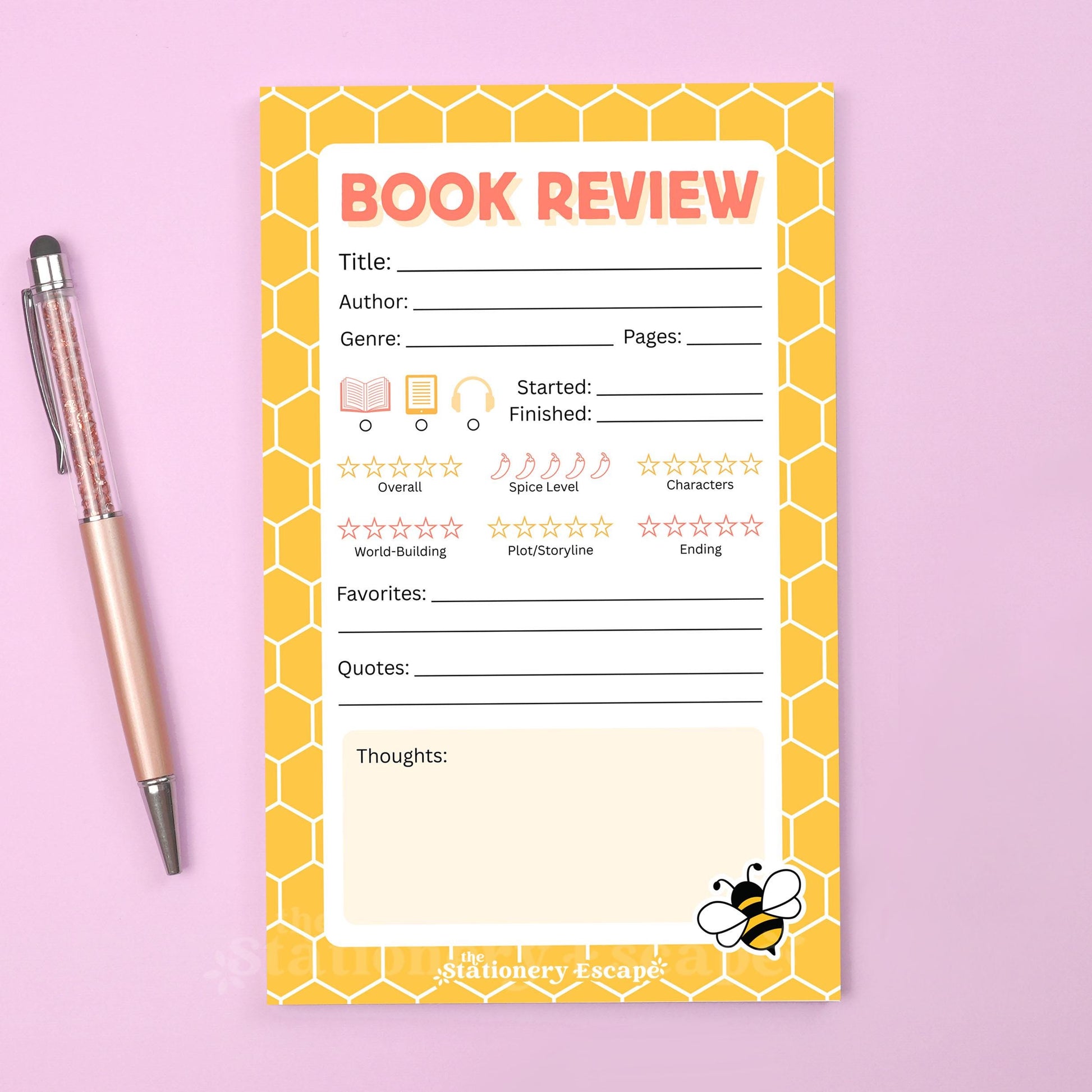 Book review notepad with honeycomb design and bee illustration on a pink background