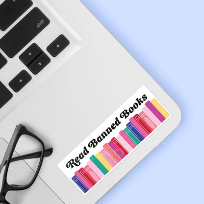 Sticker with 'Read Banned Books' text on a laptop
