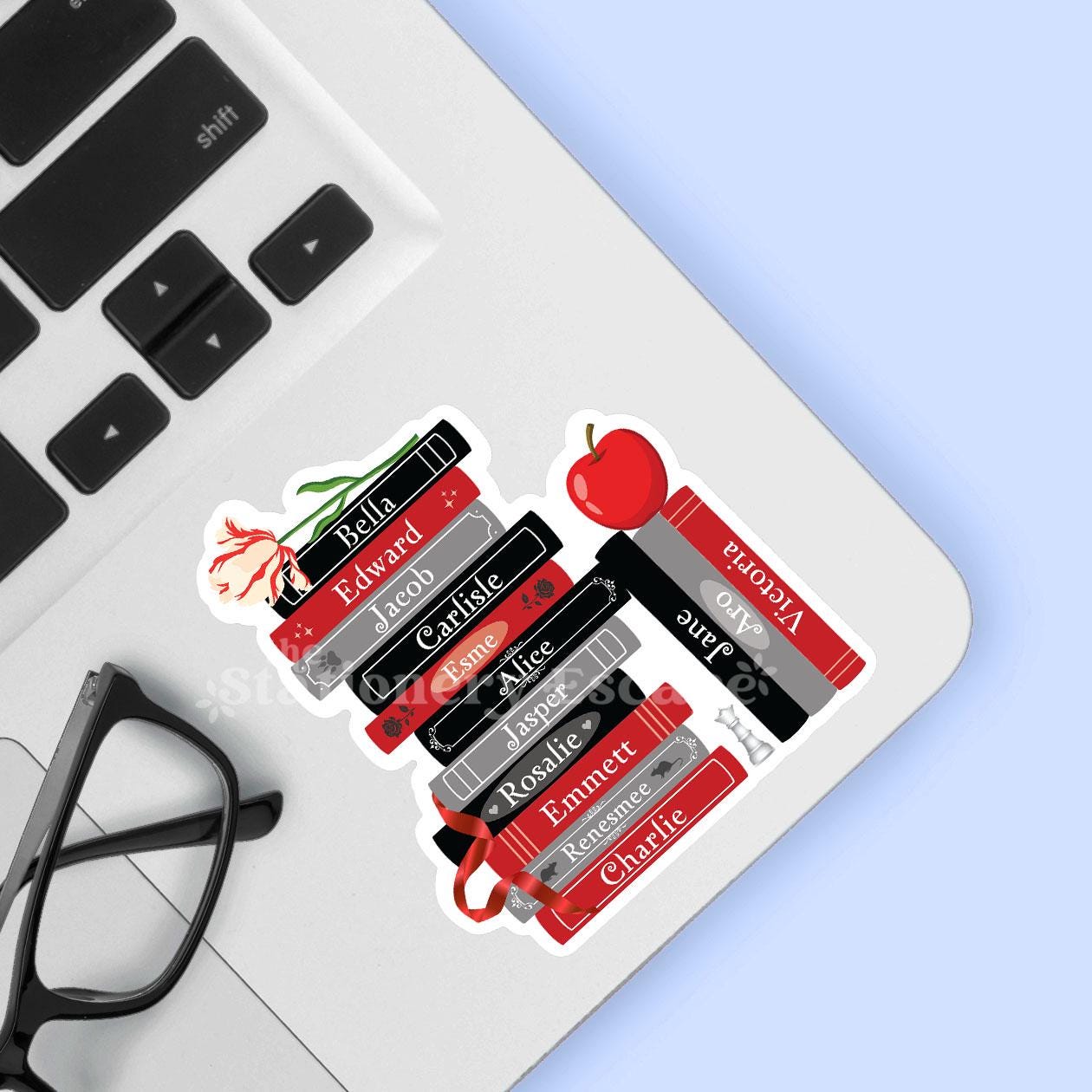 Sticker with vampire book characters on a laptop keyboard