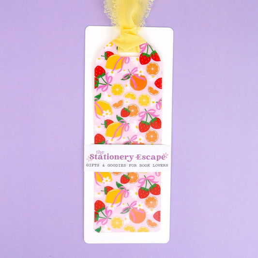 Bookmark with fruit pattern on a purple background, branded 'The Stationery Escape'.