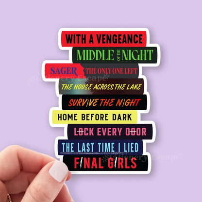 Stack of Riley Sager books with titles in various colors on a purple background