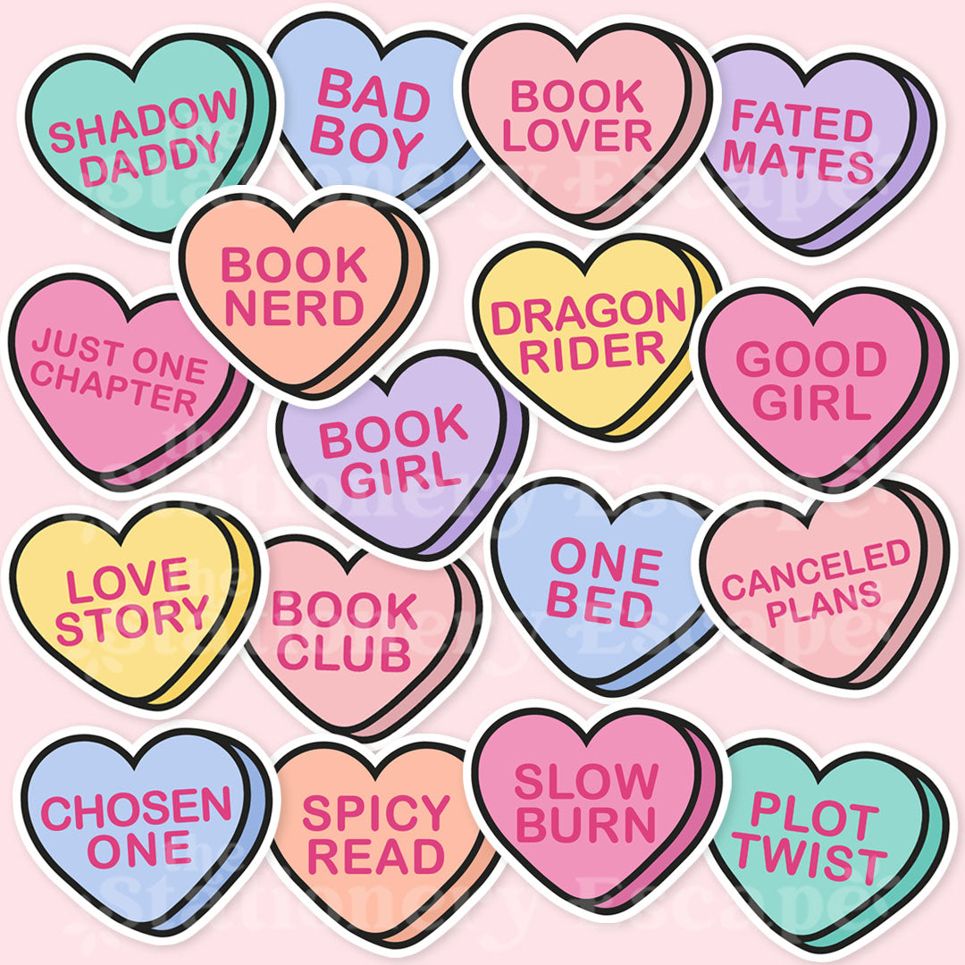 Candy heart-shaped stickers with book-themed phrases on a pink background