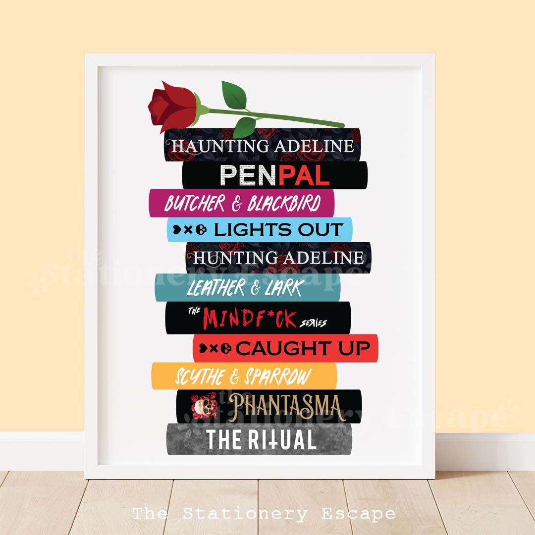 Framed book stack art print featuring the spines and titles of popular modern dark romance novels by various authors The book stack is topped by a dark red rose. 