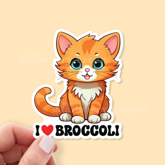 Cartoon cat sticker with 'I ❤️ Broccoli' text on a beige background