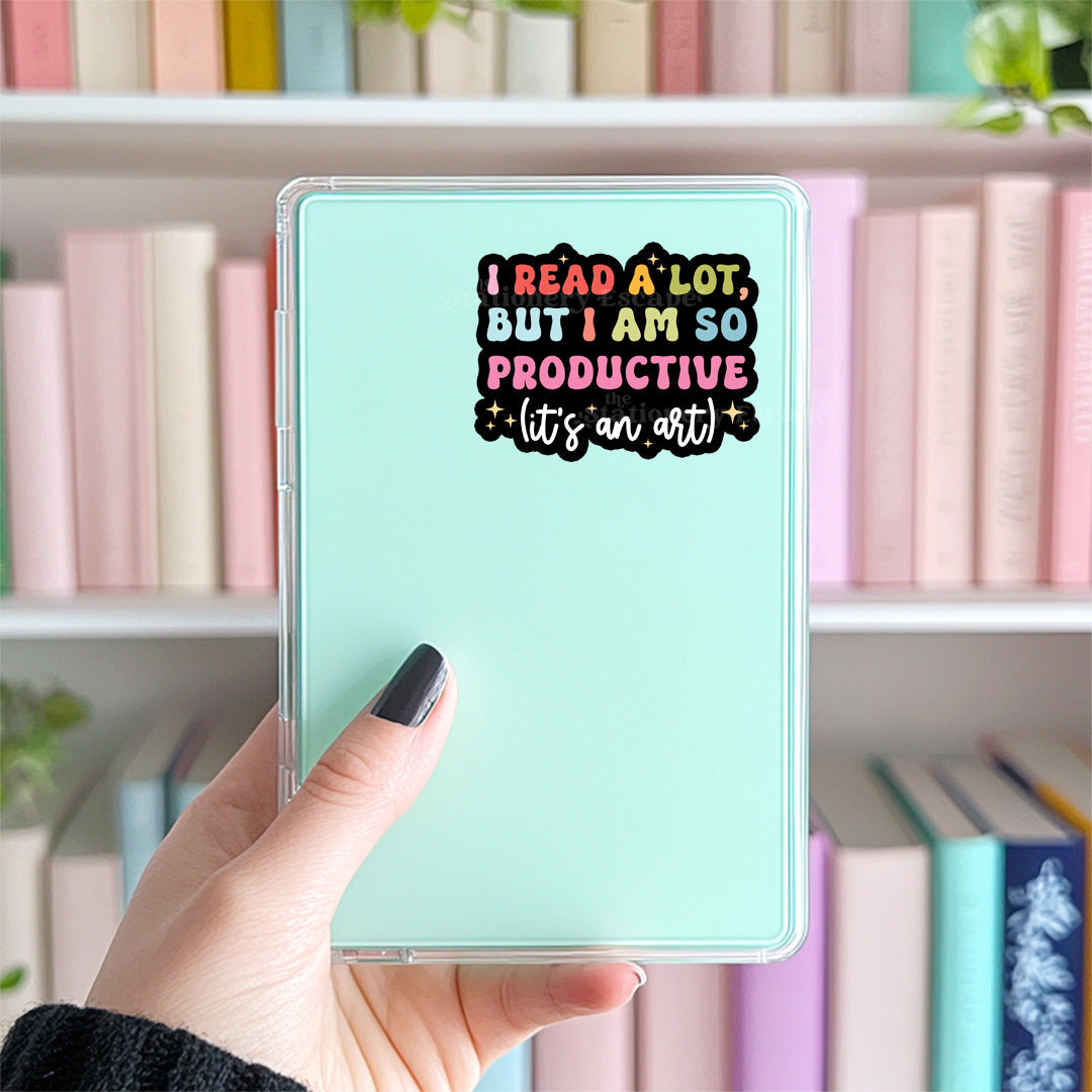 Kindle case with text 'I read a lot, but I am so productive (it's an art)' held in front of a bookshelf.