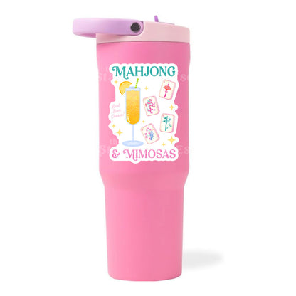Pink tumbler with 'Mahjong & Mimosas' design on a white background