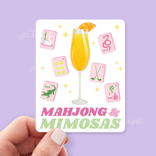 Sticker with a glass of mimosa and Mahjong tiles on a purple background