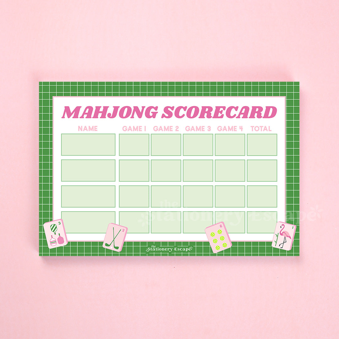Mahjong scorecard with green grid border on a pink background