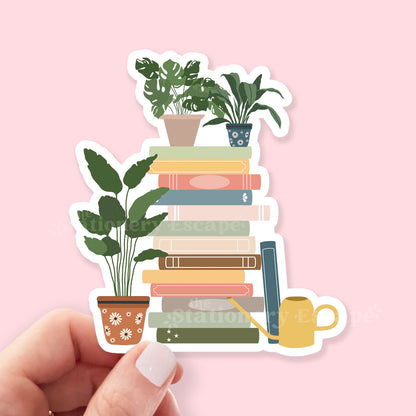Sticker of books and plants on a pink background