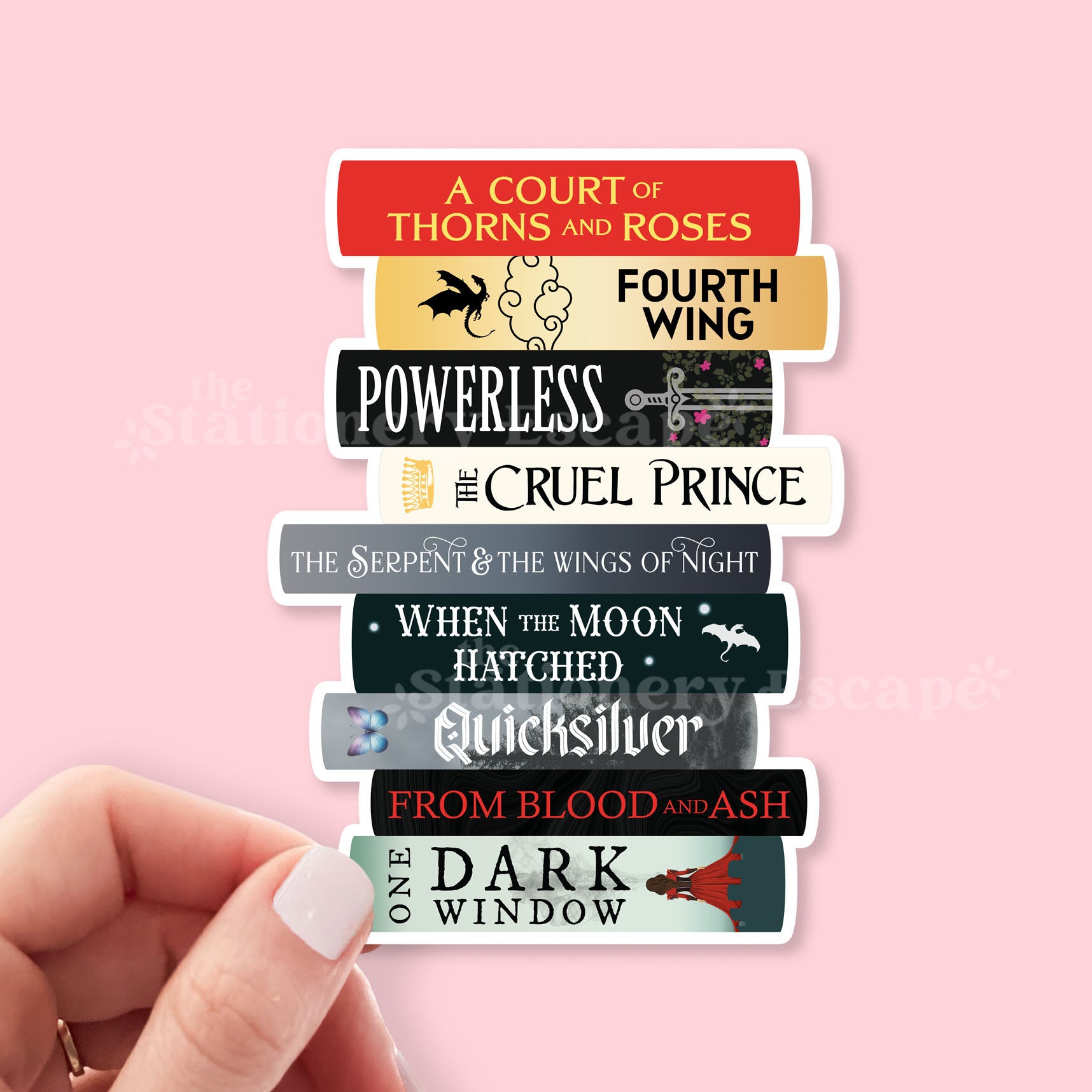 Stack of popular romantasy book title stickers on a pink background