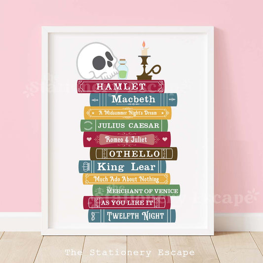 Framed colorful book stack art print featuring the works of William Shakespeare. The book stack is topped by a skull, and candlestick, and a small bottle of green liquid. 