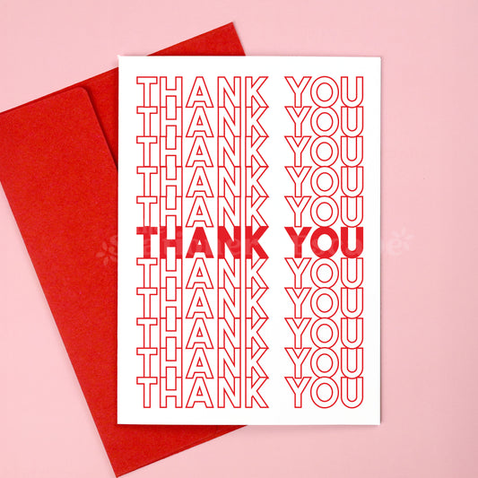 Card with 'THANK YOU' text repeated in red on a white background, with a red envelope on a pink background.