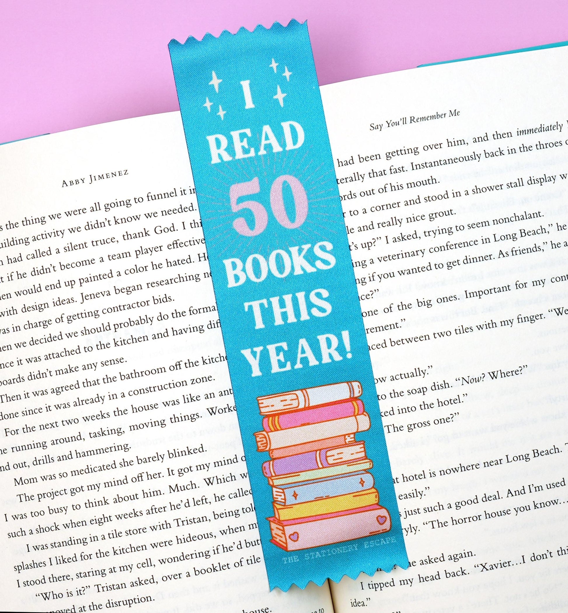 Bookmark with 'I Read 50 Books This Year!' text on a book page