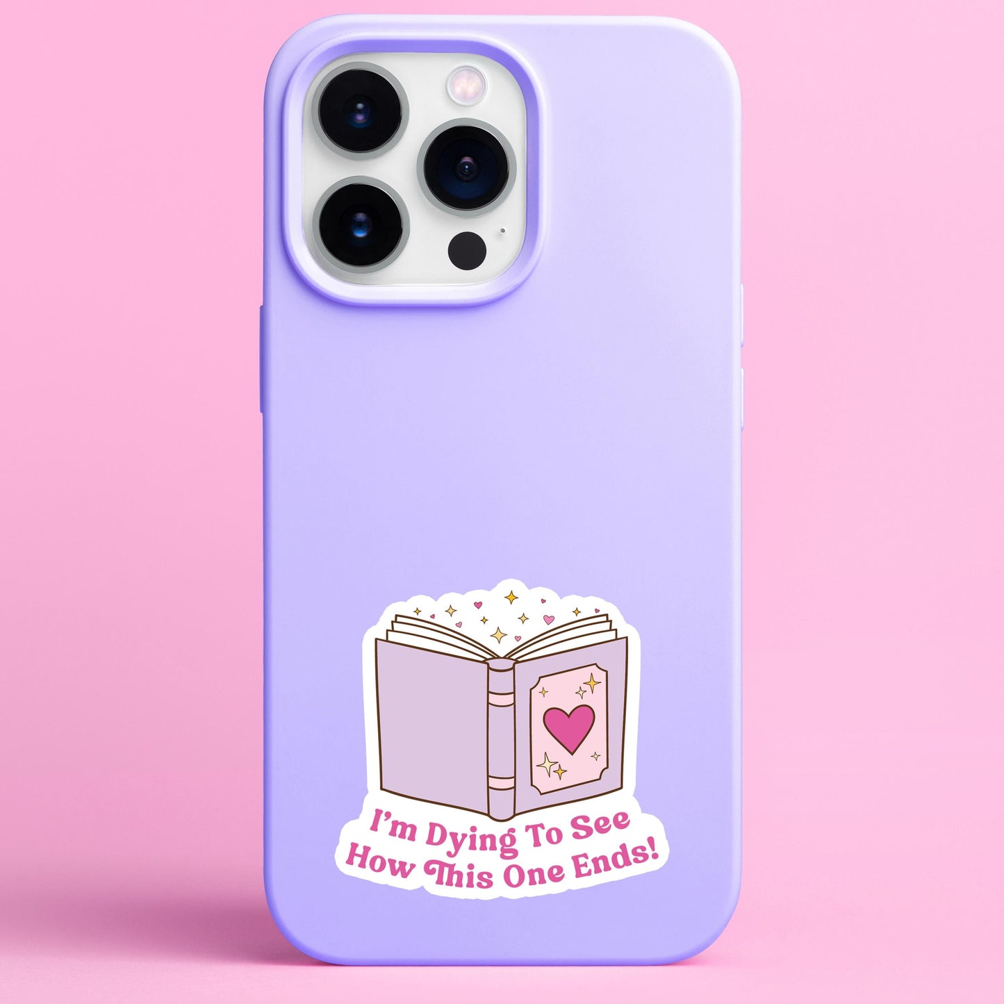 Phone case with a book sticker and text on a pink background