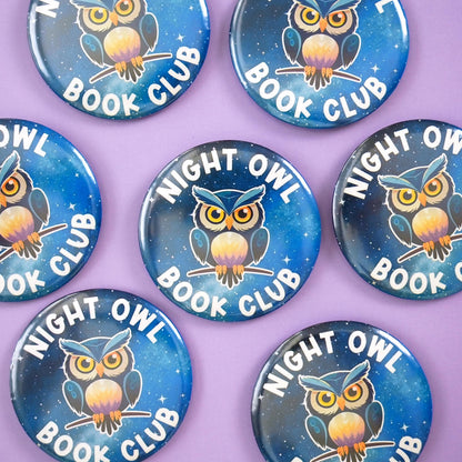 Buttons with owl design and 'Night Owl Book Club' text on a purple background